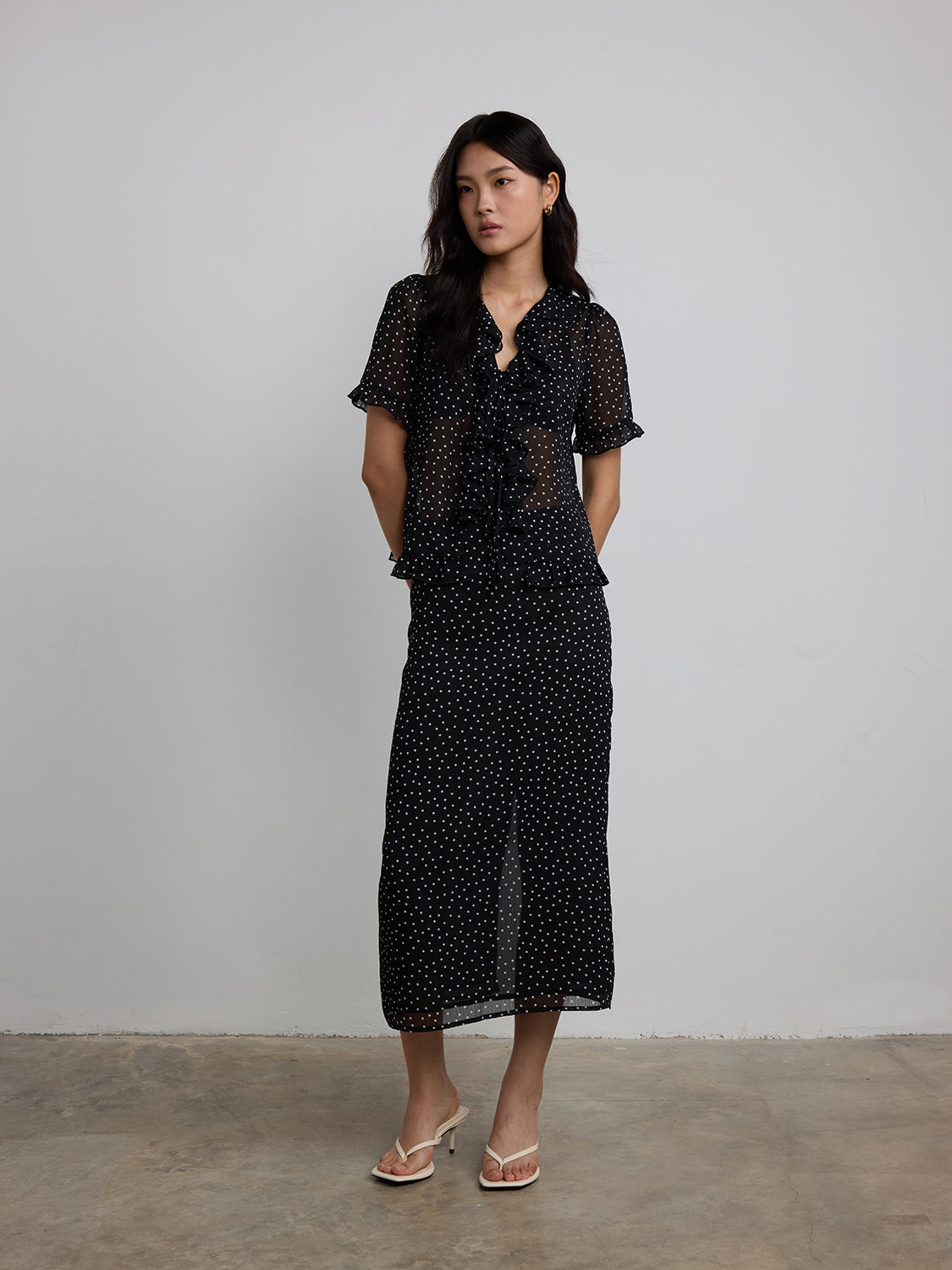 black sheer polka dot
