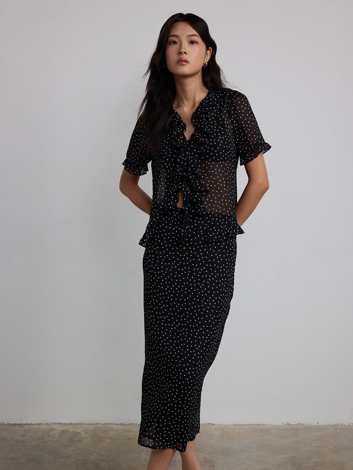 black sheer polka dot
