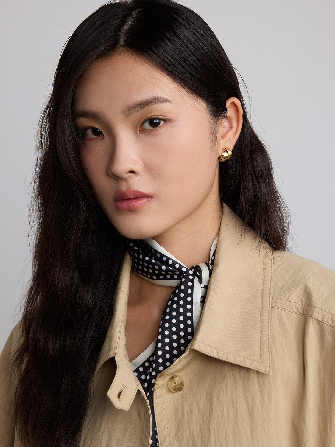 gold with black polka dot